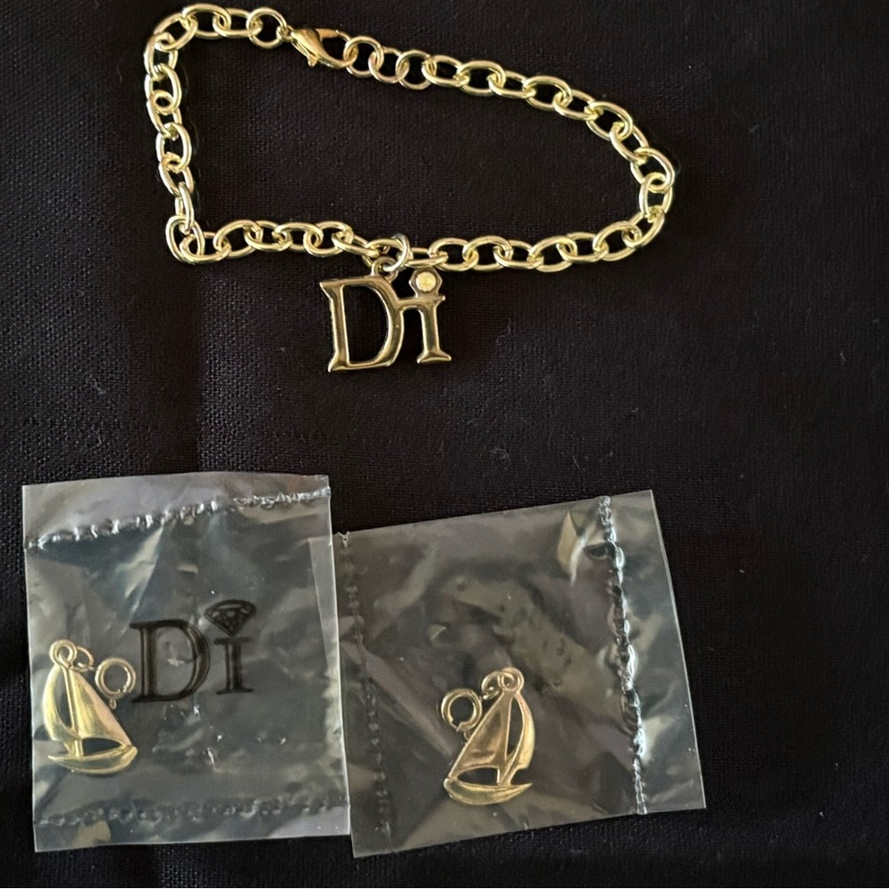 Diamond International Gold Charm Bracelet Set. 8 bracelets multiple charms. - Picture 7 of 15
